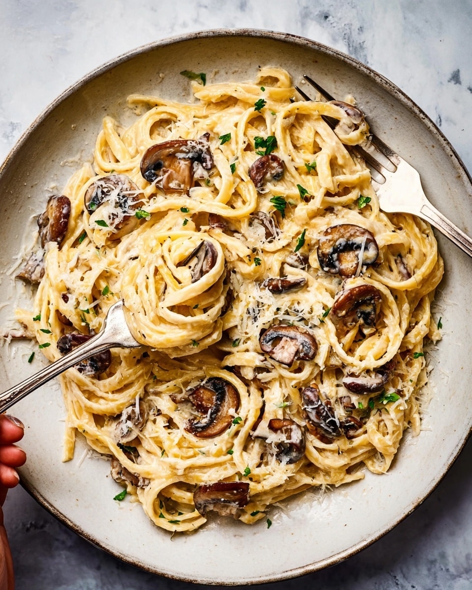 Six stuffed bell pepper halves sit in a white rectangular baking dish. Each pepper half is filled with a creamy, slightly shredded chicken mixture that is light beige with small green pieces of chopped vegetables mixed in. The peppers are a mix of bright yellow and deep red, with green stems attached, creating a colorful contrast with the filling. The chicken topping has a melted light golden cheese layer that adds a slight shine. The dish rests on a white marbled surface with a soft striped cloth partially visible underneath. Photo taken with an iphone --ar 4:5 --v 7