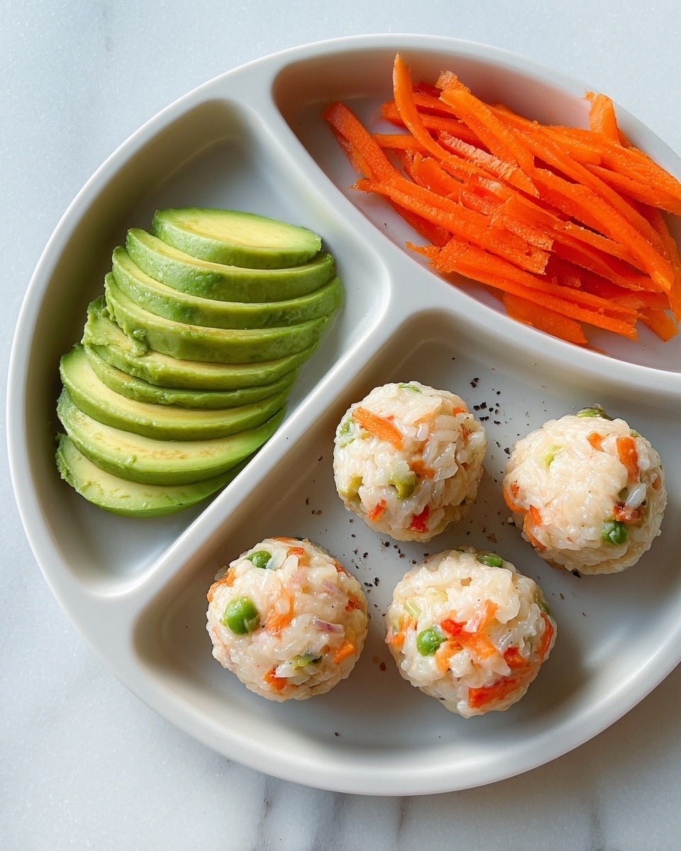 A white divided plate with three sections holds different foods on a white marbled surface. The largest section contains six round rice balls mixed with small pieces of green and orange vegetables, evenly spaced. The top left section has four slices of bright green avocado arranged in a neat row, showing smooth texture and curved shape. The top right section features a small pile of thin, orange carrot sticks seasoned with visible black pepper flakes. The overall look is neat and fresh with soft, natural lighting. Photo taken with an iphone --ar 4:5 --v 7