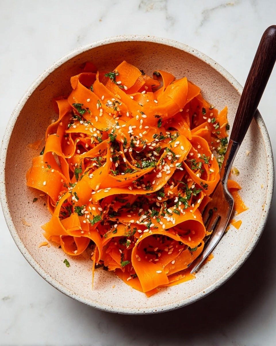 A white plate holds nine heart-shaped macarons arranged closely together, each with two smooth, rounded shells sandwiching a creamy filling layer in the middle. The macarons come in soft pastel colors: pale pink, light purple, peach, warm brown, and muted red. The creamy filling is visible in light shades of white and purple. The shells have a slightly glossy finish with a delicate texture at the edges, while the filling appears smooth and soft. The setup sits on a white marbled surface, giving a clean and elegant look. photo taken with an iphone --ar 4:5 --v 7